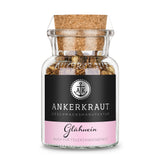Glass jar of Ankerkraut Glühwein spice mix with cork lid and black pink label