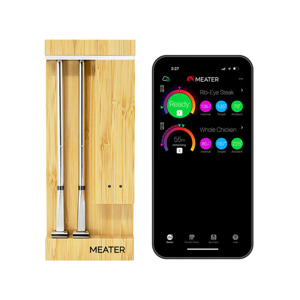 Smartes Fleischthermometer MEATER Pro Duo neben Smartphone mit geöffneter Koch-App