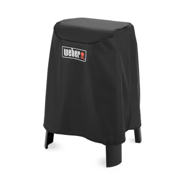 Schwarze Weber Premium Abdeckhaube über einem Lumin Elektrogrill mit Stand