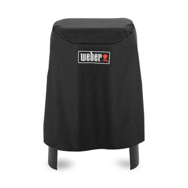 Schwarze Weber Premium Abdeckhaube über einem Lumin Elektrogrill