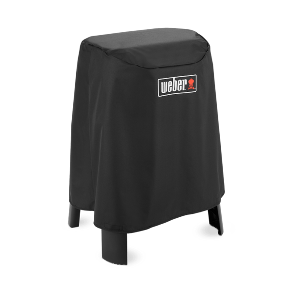 Schwarze Weber Premium Abdeckhaube über einem Lumin Elektrogrill mit Stand