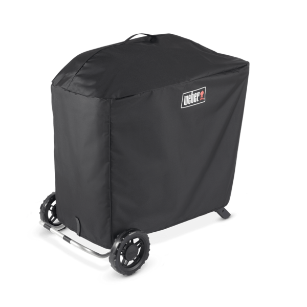 Schwarze Weber Traveler Premium Abdeckhaube über einem mobilen Grill
