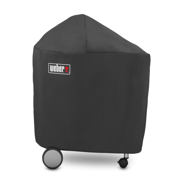 Weber Abdeckhaube Premium über einem Performer GBS Grill mit sichtbarem Weber-Logo