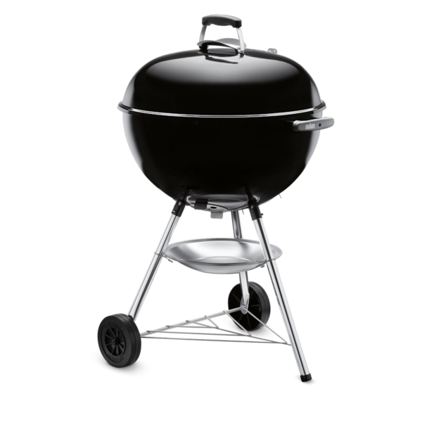Schwarzer Bar-B-Kettle Grill mit porzellanemailliertem Deckel und Kessel auf grünem Hintergrund