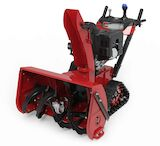 Rote Toro Power Max TRX HD 1432 OHXE Schneefräse mit Raupenketten und Bedienelementen