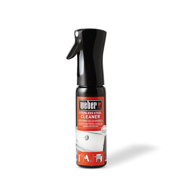 Weber Edelstahl-Reiniger Flasche mit ergonomischem Sprühkopf auf grünem Hintergrund