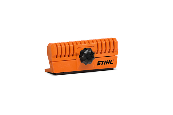 Stihl Führungsschienenrichter in Orange mit schwarzem Logo und integrierter Flachfeile