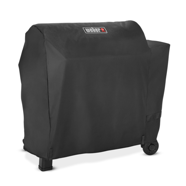 Weber Premium Abdeckhaube auf Searwood XL Grill mit sichtbaren Klettbändern und Logo
