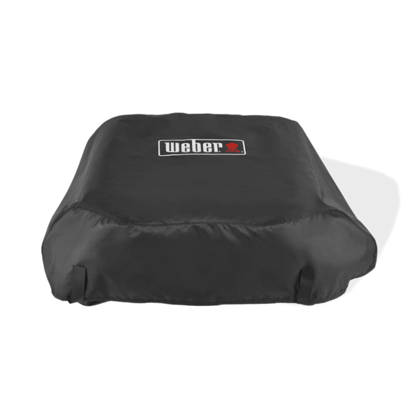 Weber Prem. Abdeckhaube Slate 43cm über einer Plancha mit Weber-Logo