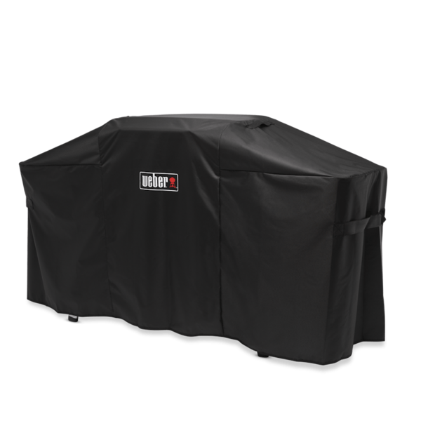 Schwarze Weber Premium-Abdeckhaube über einer Plancha mit Tisch