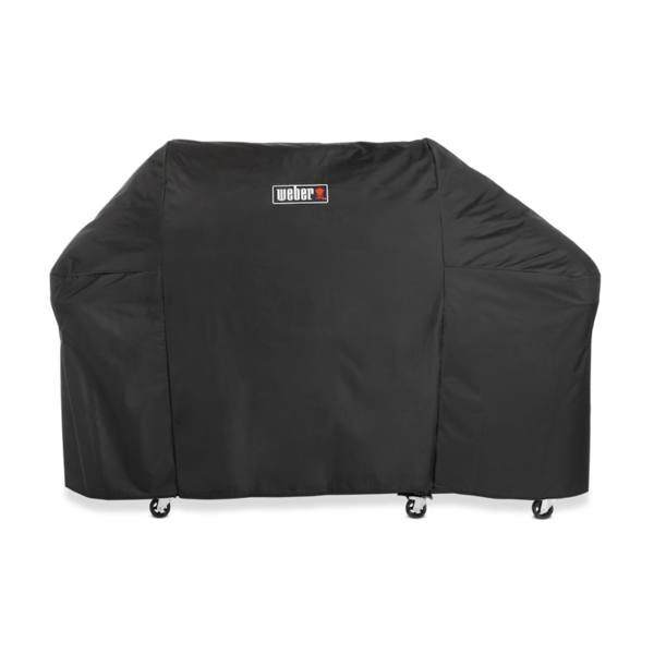 Schwarze Weber Premium Abdeckhaube Summit FS38 über einem großen Grill
