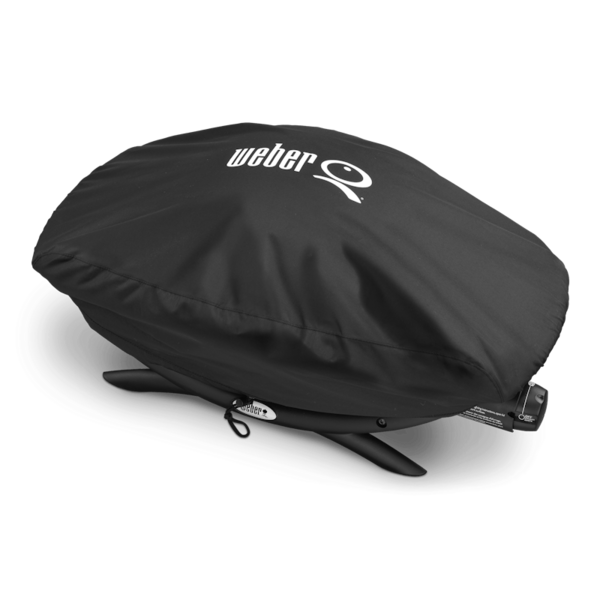 Weber Abdeckhaube Standard Q200(0) Serie über einem Grill mit Klettbändern und Logo