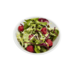 Weber Porzellanschüssel mit frischem Salat auf grünem Hintergrund