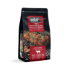 Packung Weber Räucherchips Beef 700g mit Beschreibung und Bild von gegrilltem Fleisch
