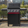 Weber Spirit E-425C STEALTH Gasgrill auf Terrasse mit Stadtblick