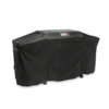 Weber Premium Abdeckhaube auf einer Plancha mit sichtbarem Logo und Klettbändern