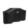 Schwarze Weber Premium Abdeckhaube über einer Plancha mit klappbarem Tisch