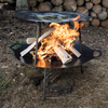 Petromax Grill- und Feuerschale fs48 mit brennendem Holz im Freien