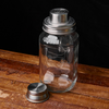 O'Donnell Moonshine Shakerdeckel auf Mason Jar mit Eis auf Holztisch