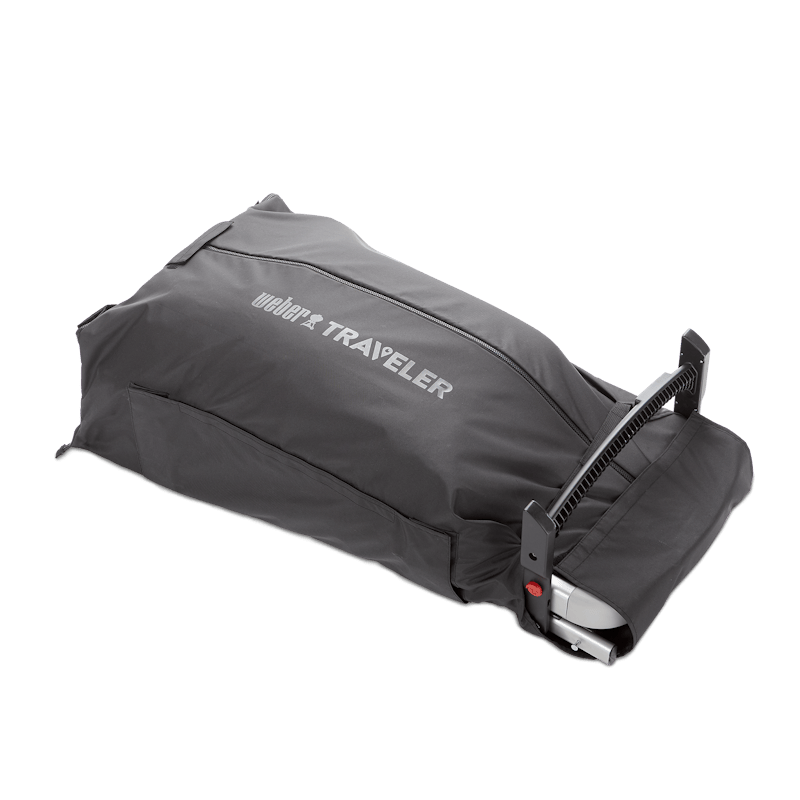 Weber Traveler Kofferraumschutz über einem Grill mit sichtbaren Griff und Bedienelementen