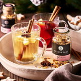Two glasses of mulled wine with Ankerkraut spice mix on a festive table