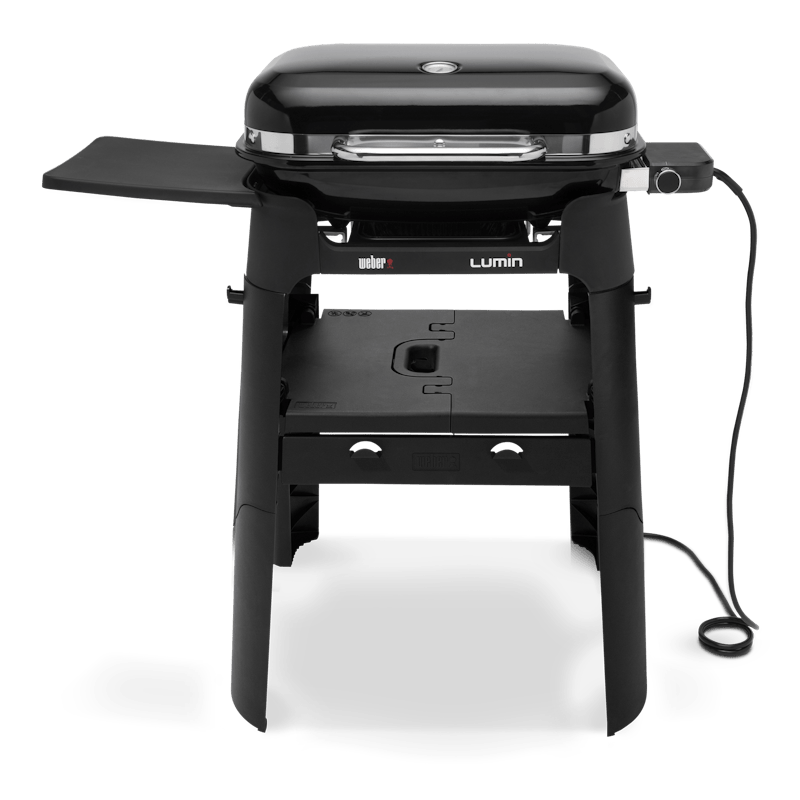 Weber Lumin Elektrogrill auf einem Stand mit Seitentisch in Schwarz