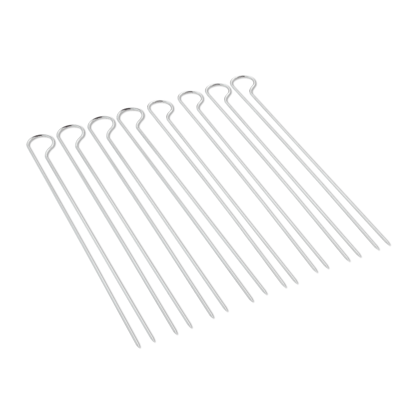 Set von 8 Weber Doppelspießen auf grünem Hintergrund