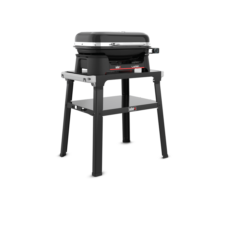 Weber LUMIN Elektrogrill auf Stand in Schwarz-Weiß, ideal für Outdoor-Kochen