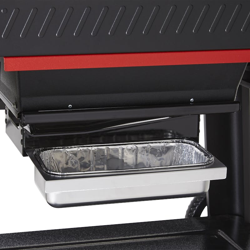 Detailansicht des Weber SEARWOOD Holzpelletgrills mit Fokus auf die Auffangschale