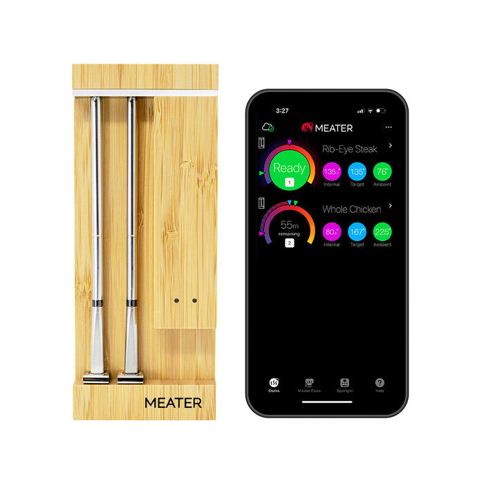 Smartes Fleischthermometer MEATER Pro Duo neben Smartphone mit geöffneter Koch-App