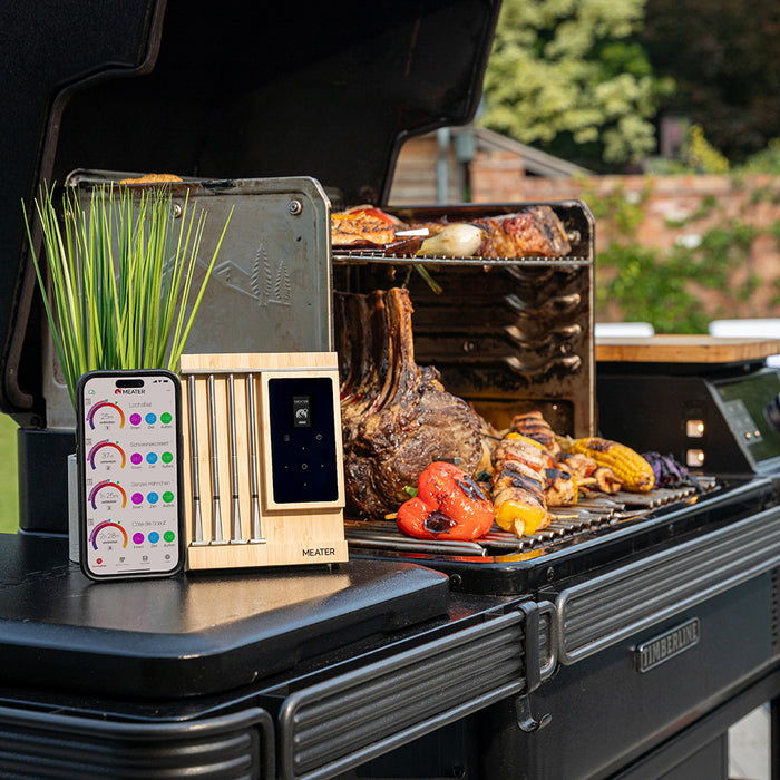 Outdoor-Grill mit MEATER Pro XL Thermometer und Smartphone-App zur Temperaturüberwachung