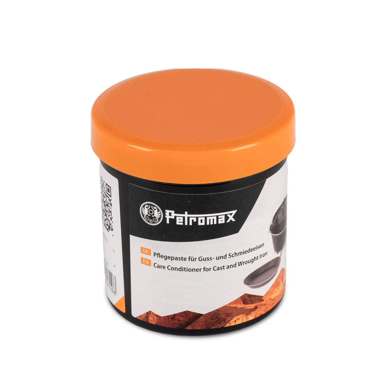 Petromax Einbrenn- und Pflegepaste in einer Dose mit orangefarbenem Deckel