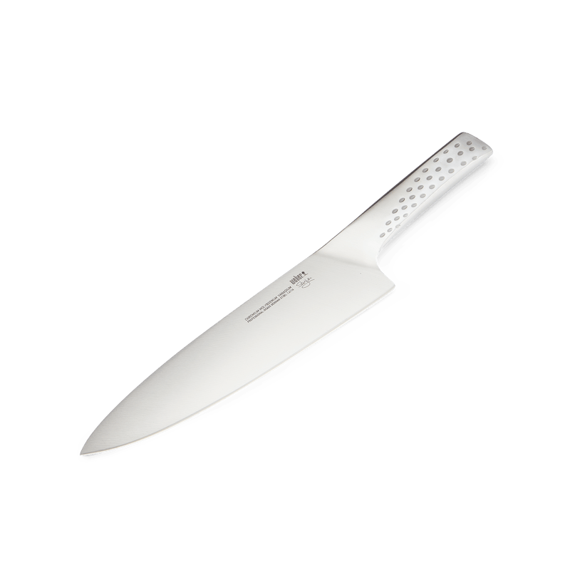 Weber Deluxe-Fleischmesser auf dunkelgrünem Hintergrund
