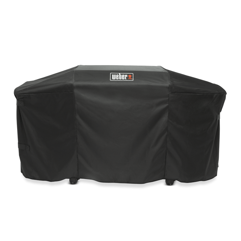 Weber Premium Abdeckhaube auf einer Plancha, schwarz mit rotem Weber-Logo