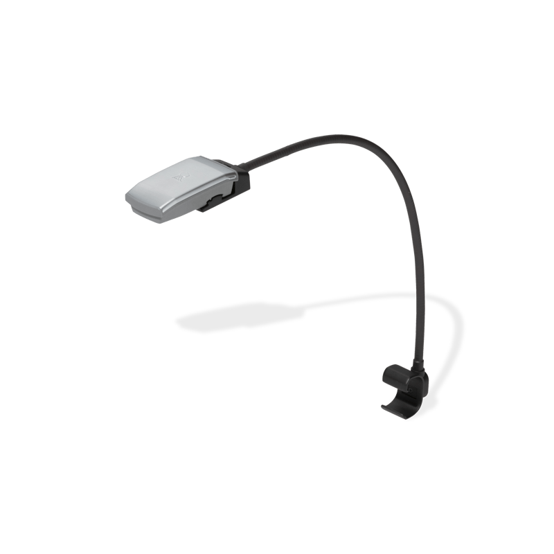 Flexible Weber WORKS Lampe mit LED und Klemmvorrichtung auf grünem Hintergrund